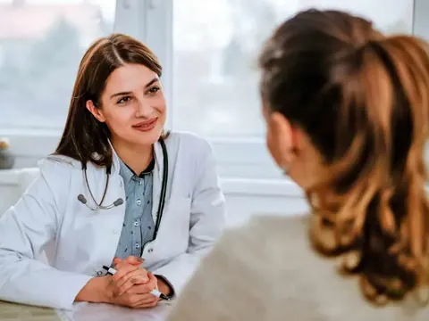 Healthcare provider consulting with a patient