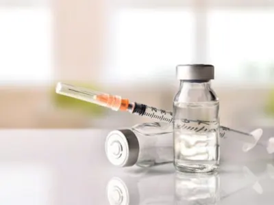 Small vial and syringe